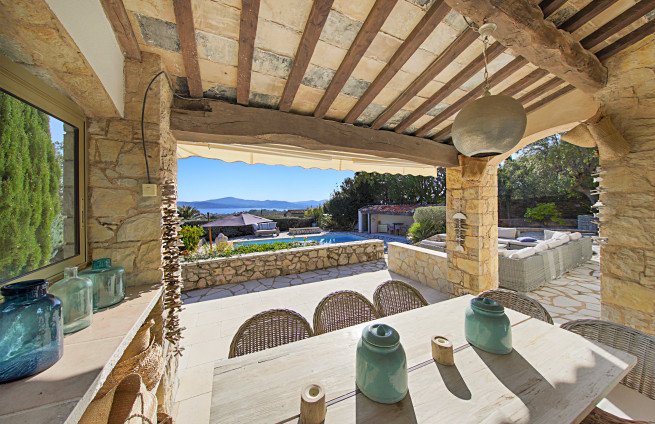 Covered terrace for meals and summer cooking at Villa Grimaud