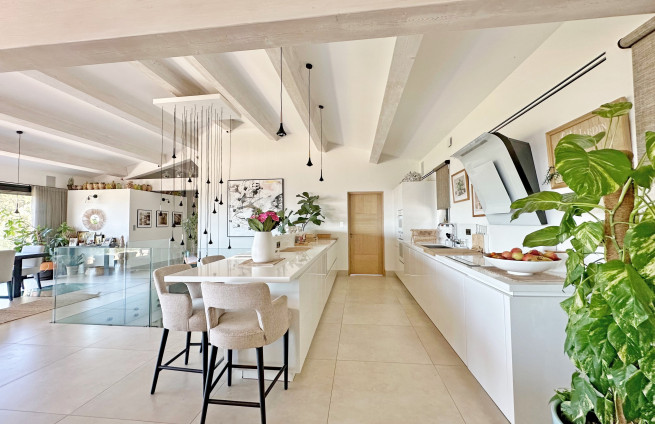 high-end kitchen with central island in a luxury villa