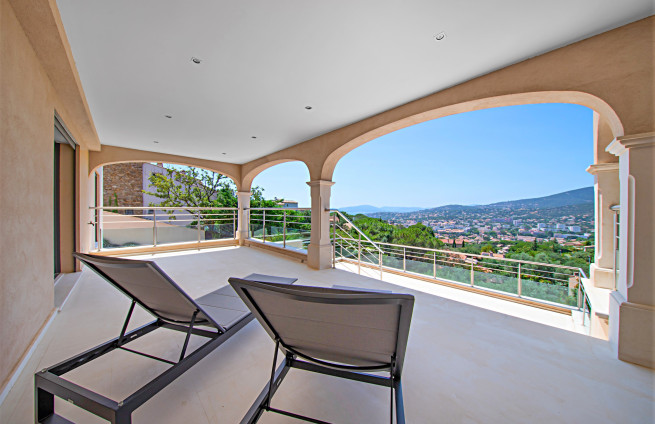 en suite bedroom with private terrace in villa