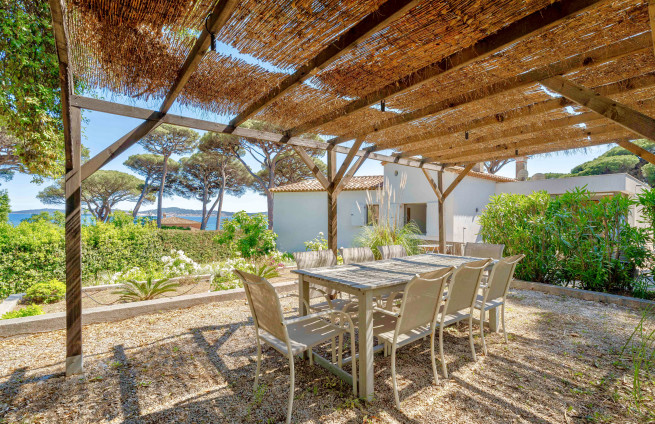 sun terrace with deck chairs and a view of the Gulf of Saint-Tropez