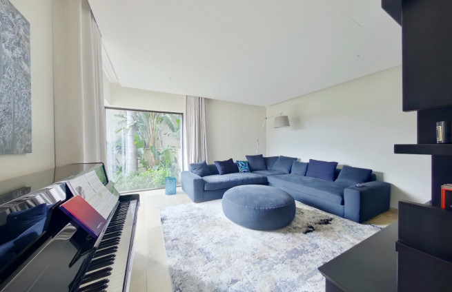 Cozy TV lounge with a warm atmosphere at Villa Beauvallon