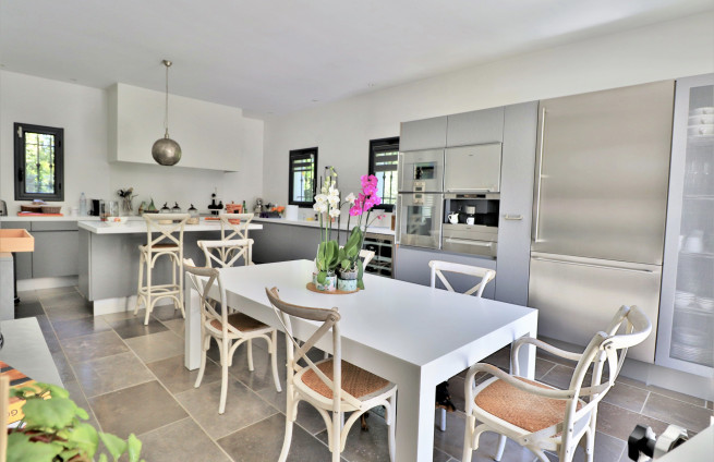 Gaggenau fitted kitchen with central island and Gassin marble top